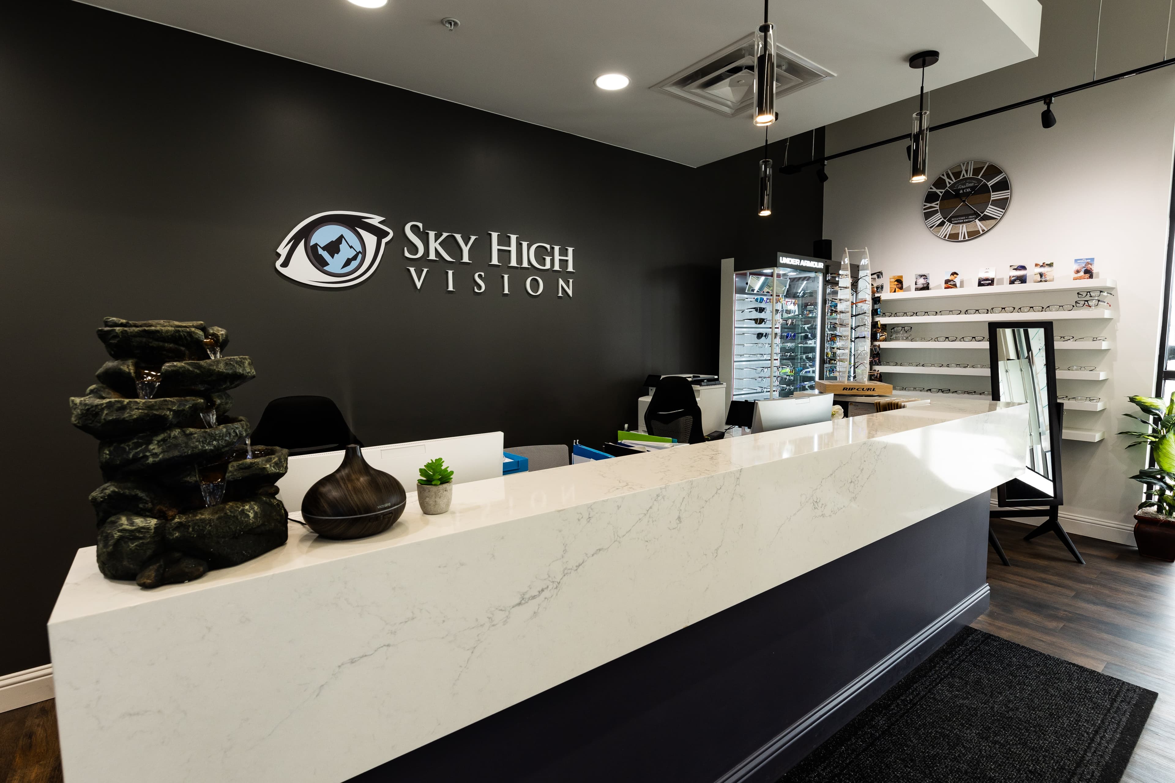 The Sky High Vision reception desk and frame wall