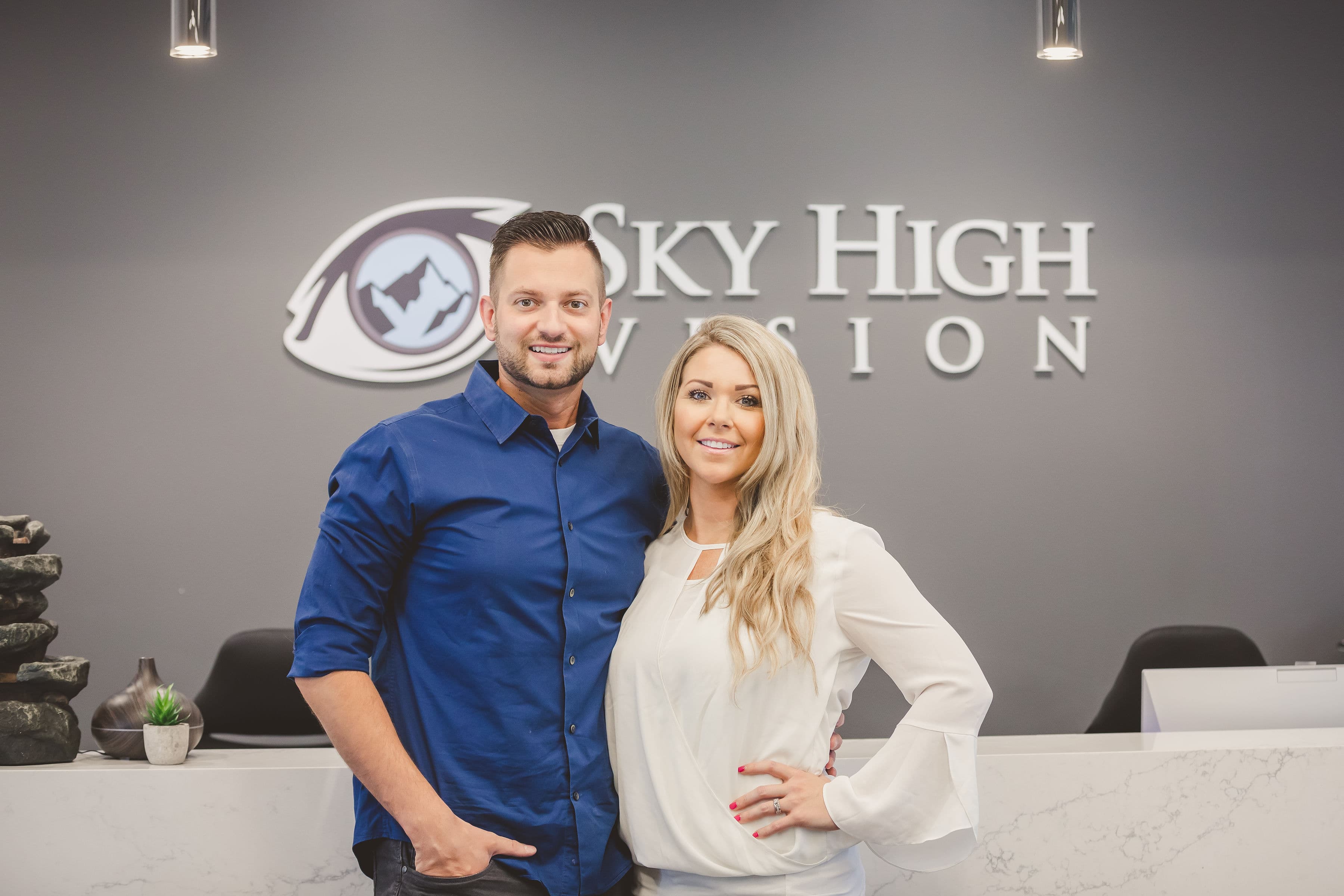 Dr. Marc Ofchinick and Dr. Megan Kirchner at the Sky High Vision front desk
